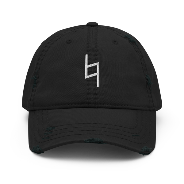 A distressed black dad hat with a white embroidered Natural Sign musical symbol on the front.