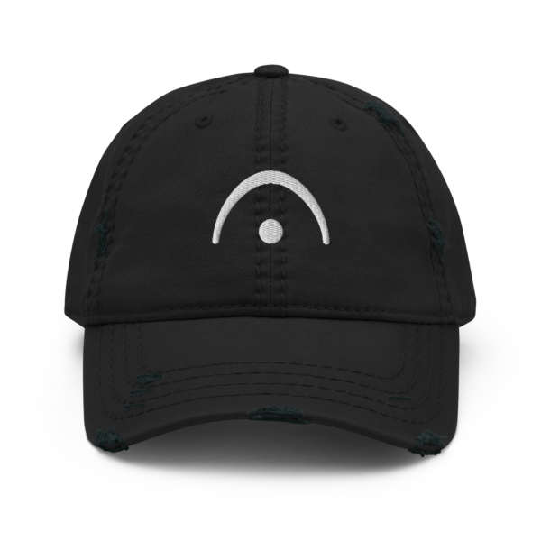 A distressed black dad hat with a white embroidered Fermata musical symbol on the front.
