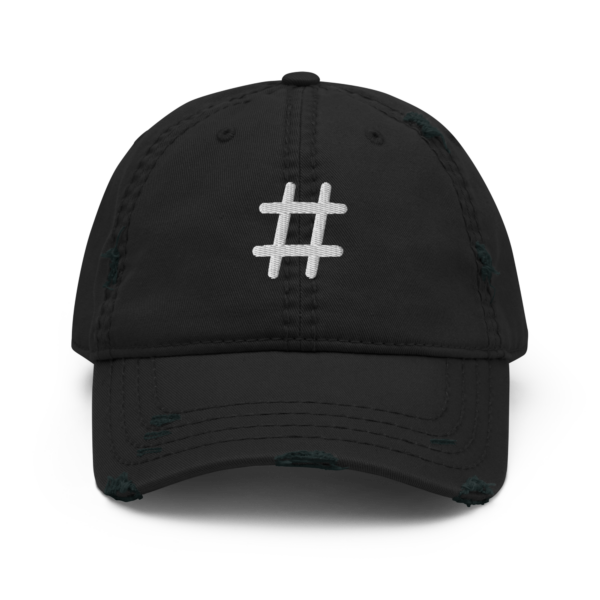 A distressed black dad hat with a white embroidered Sharp musical symbol on the front panel.