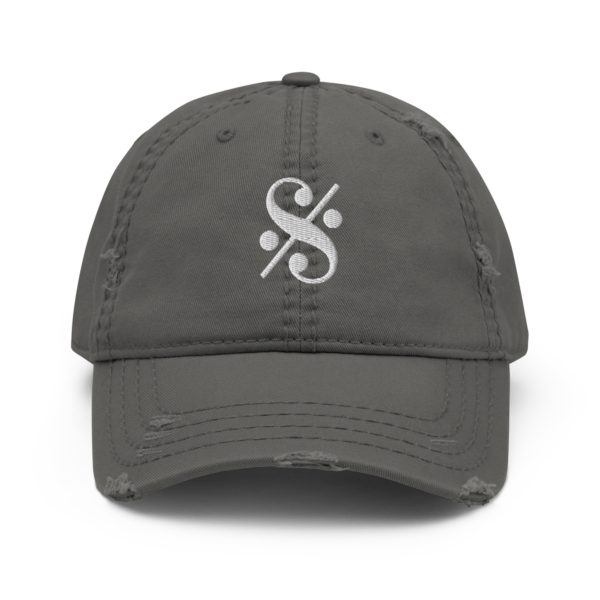 A distressed dad hat with a high-quality white embroidered Segno musical symbol.