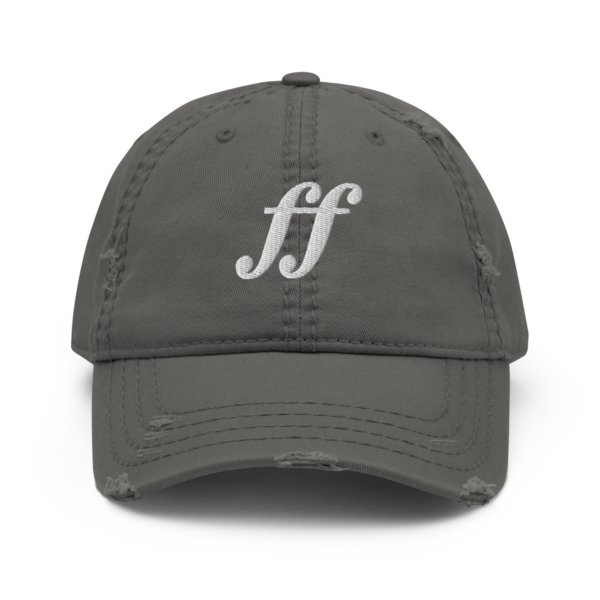 A black distressed dad hat with white embroidered Fortissimo musical symbols on the front.