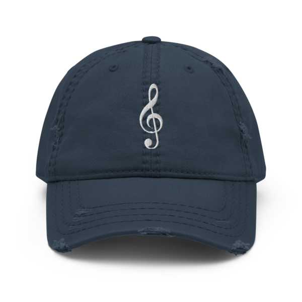 A vintage-style distressed dad hat featuring a white embroidered Treble Clef musical symbol.