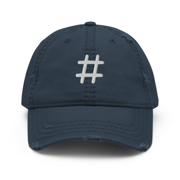 A distressed black dad hat with a white embroidered Sharp musical symbol on the front panel.