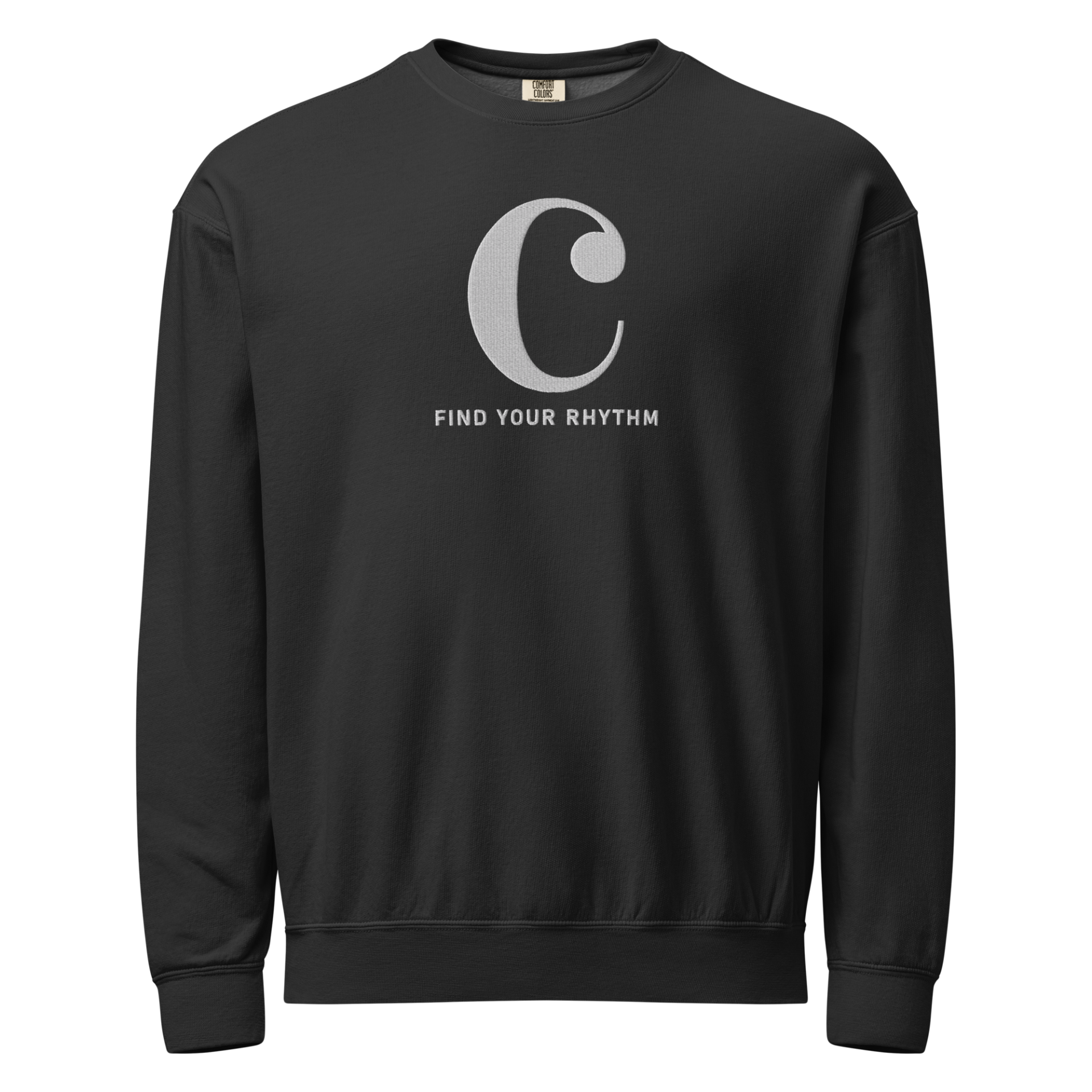 Minimalist Common Time symbol with "Find Your Rhythm" text on a vintage-style garment-dyed fleece sweatshirt, flat lay view.