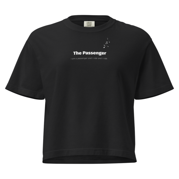 Woman wearing The Passenger heavyweight boxy tee with minimalist typography on premium garment-dyed cotton.
